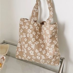 Apricot colored floral tote bag